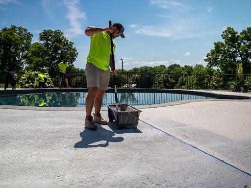 Man working by pool