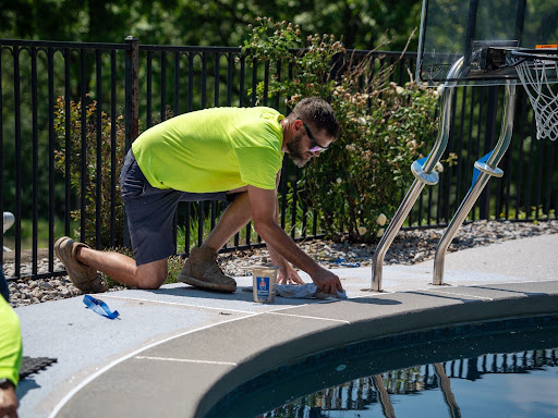 Man working by pool
